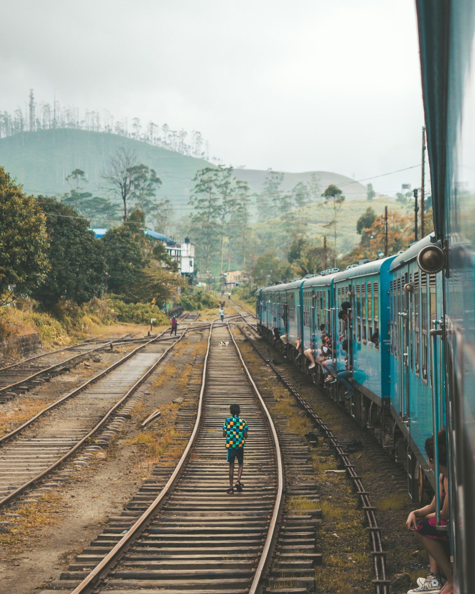 person standing on train track